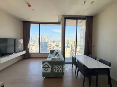 Modern living room with stunning city view and elegant furnishings