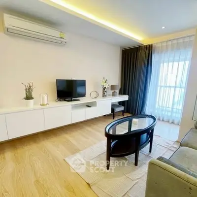 Modern living room with sleek furniture and natural light