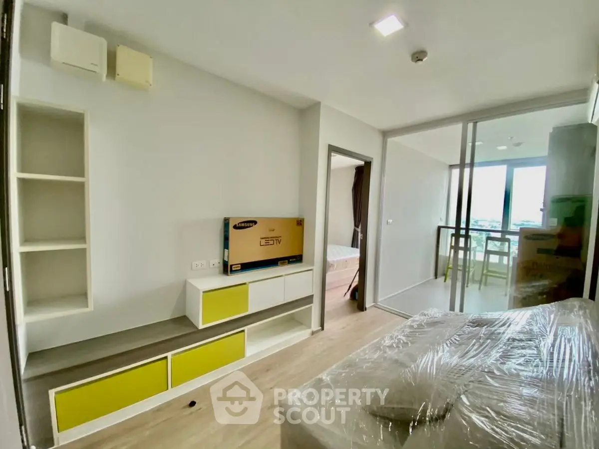 Modern apartment interior with sleek design and balcony view