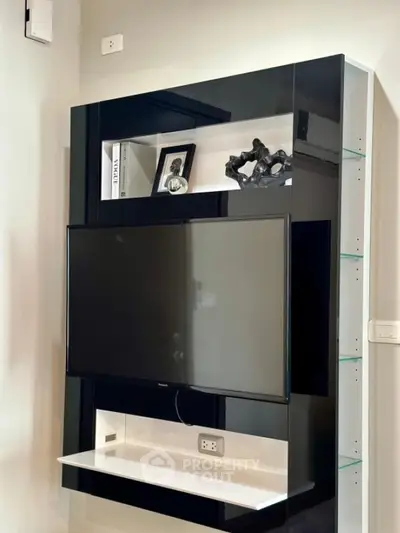 Modern living room with sleek TV wall unit and stylish decor