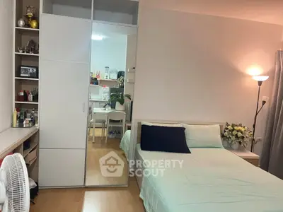 Cozy bedroom with mirrored wardrobe and modern decor