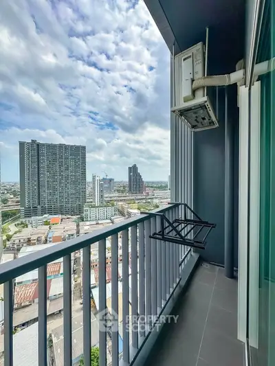 Stunning high-rise balcony view with cityscape and modern architecture.