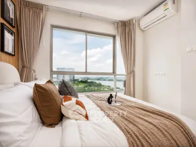 Luxurious bedroom with stunning river view and modern decor
