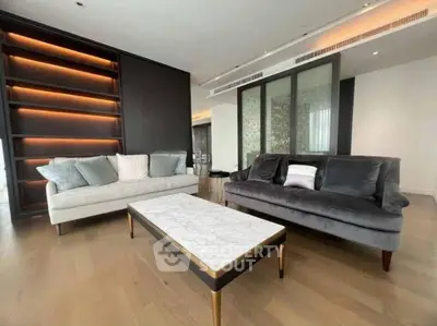 Luxurious modern living room with elegant sofas and stylish lighting