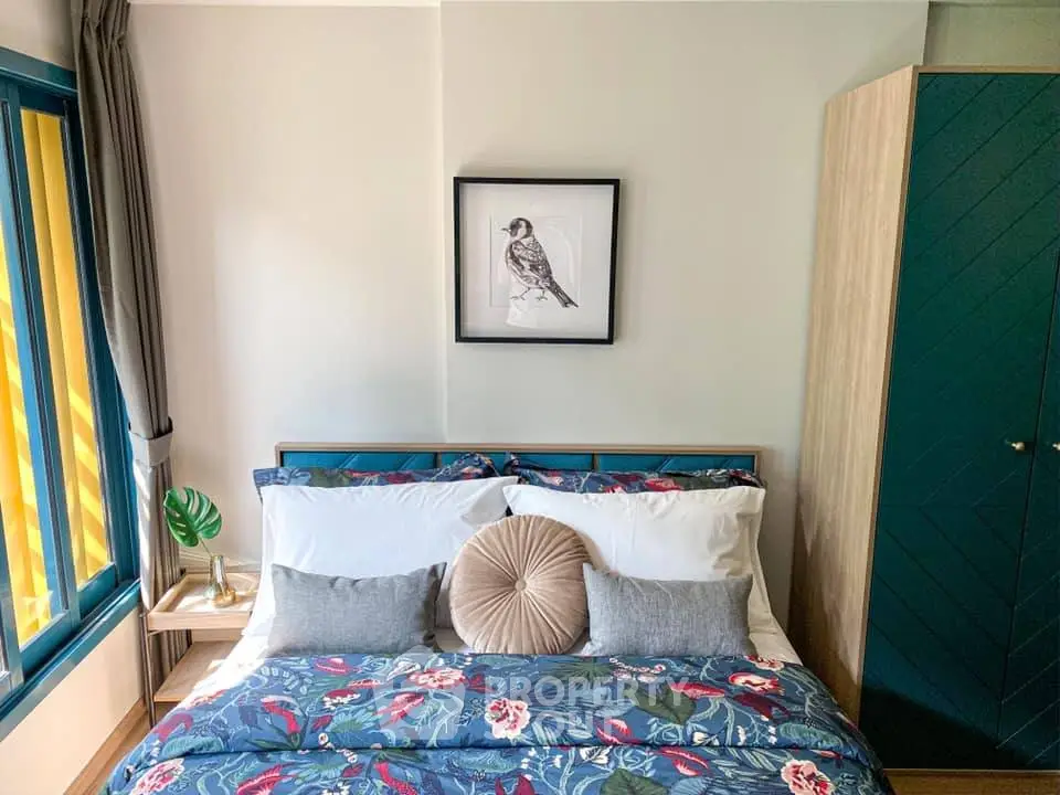 Charming bedroom with vibrant floral bedding and stylish decor