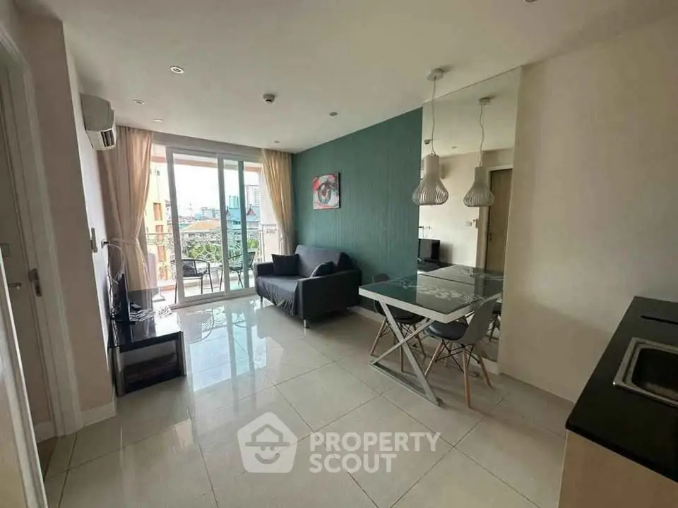Modern living room with balcony view and stylish dining area