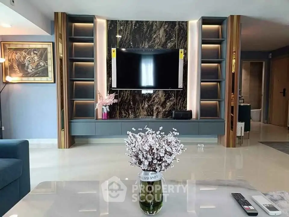 Luxurious living room with modern TV unit and elegant decor