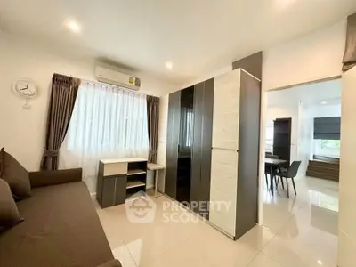 Modern living room with sleek furniture and natural light