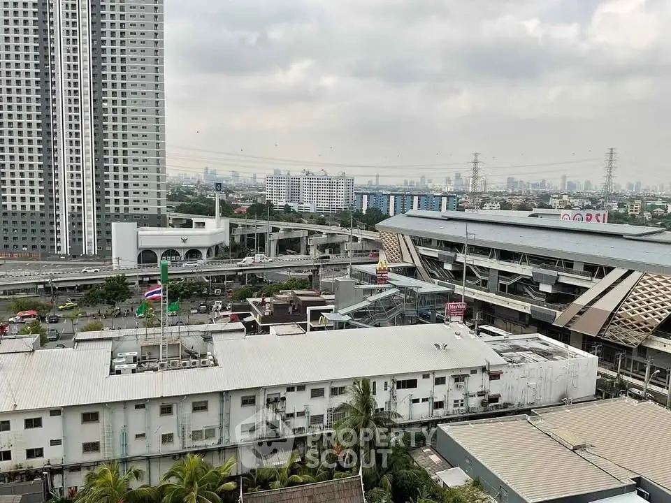 Urban cityscape view with high-rise buildings and transportation hub