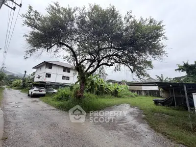 Charming rural property with lush greenery and spacious surroundings, perfect for serene living.
