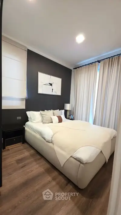 Cozy modern bedroom with elegant decor and natural light