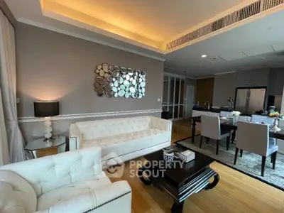 Luxurious living room with elegant decor and open kitchen layout