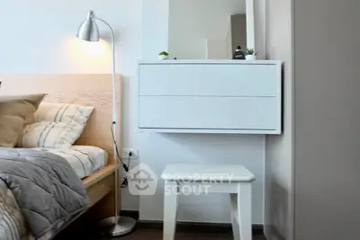 Modern bedroom with sleek furniture and cozy lighting