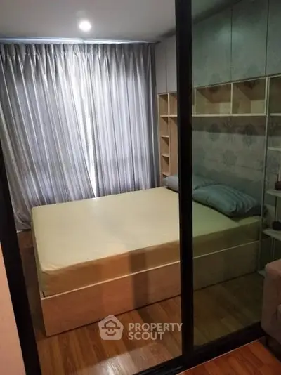 Cozy bedroom with modern design and ample natural light