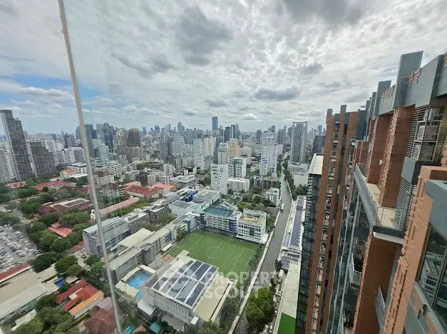 Stunning cityscape view from high-rise building with expansive skyline and urban landscape.