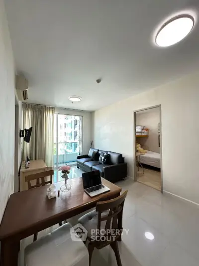 Modern living room with stylish decor and ample natural light