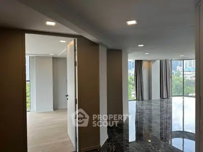 Spacious modern apartment with marble flooring and city view