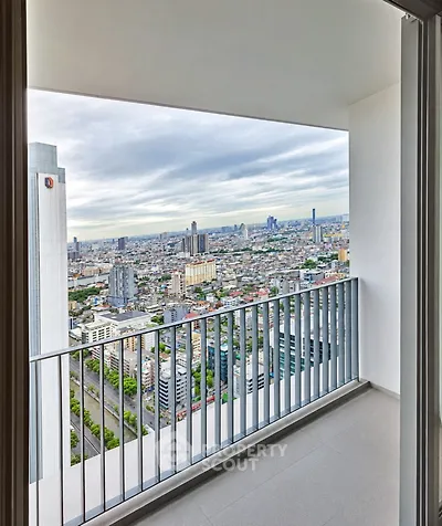 Stunning high-rise balcony with panoramic city views, perfect for urban living enthusiasts.