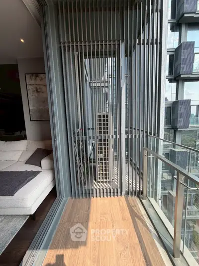 Modern apartment balcony with sleek design and city view