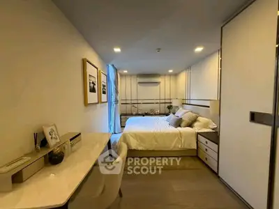 Luxurious modern bedroom with elegant decor and ample natural light
