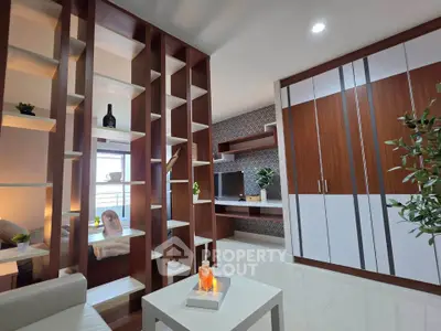 Modern living room with stylish shelving and built-in workspace