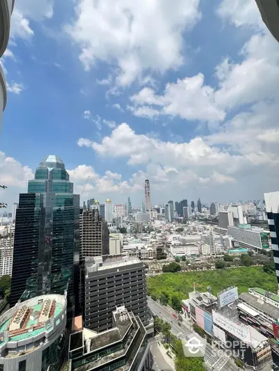 Stunning cityscape view from high-rise building with clear blue sky