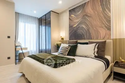 Luxurious bedroom with elegant decor and large window for natural light