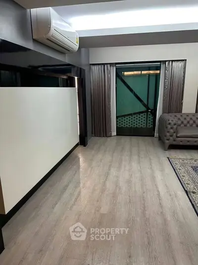 Modern living room with air conditioning and stylish decor