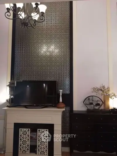 Elegant living room with stylish decor and modern TV setup