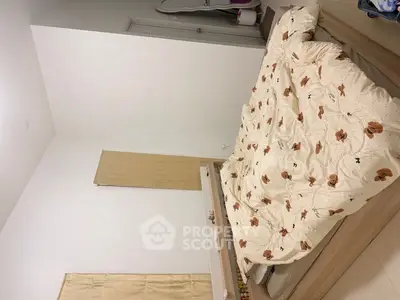 Cozy bedroom with floral bedding and minimalist decor