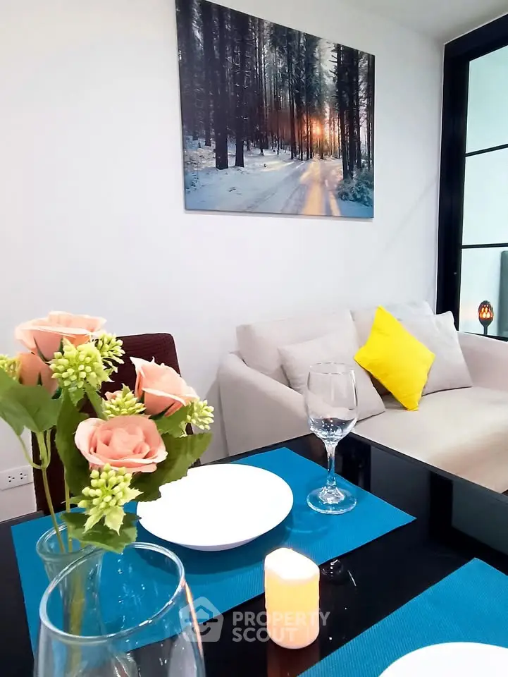 Chic modern living room with elegant dining setup and cozy sofa, perfect for urban living.