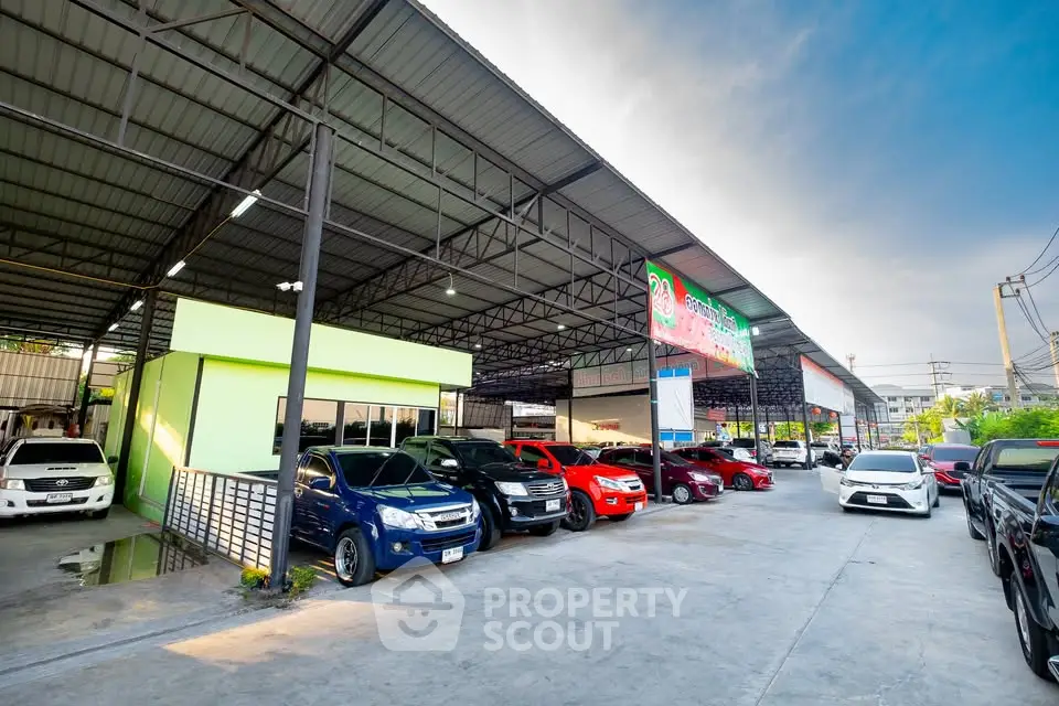 Spacious commercial property with ample parking and modern facilities, ideal for automotive businesses.