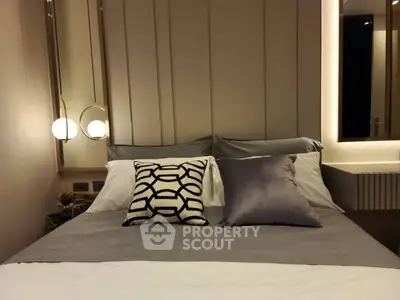 Luxurious modern bedroom with stylish decor and ambient lighting