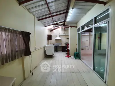 Spacious kitchen with open layout and sliding glass doors