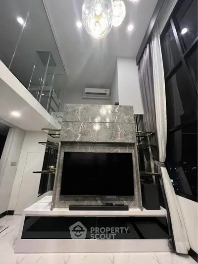 Luxurious modern living room with high ceilings and elegant marble TV wall