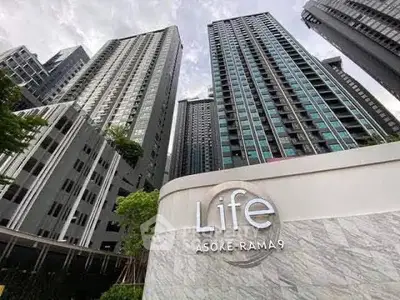 Modern high-rise condominium towers at Life Asoke-Rama 9 with sleek architecture and urban appeal.