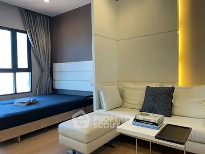 Modern studio apartment with cozy living area and stylish bedroom