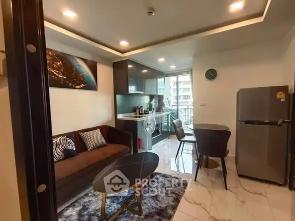 Modern living room with open kitchen and stylish decor