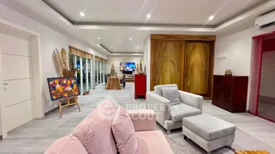 Spacious modern living room with stylish decor and comfortable seating