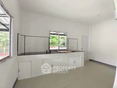 Spacious kitchen with modern design and ample natural light