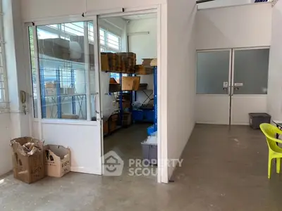 Spacious storage area with ample shelving and natural light, ideal for organizing and storing goods efficiently.