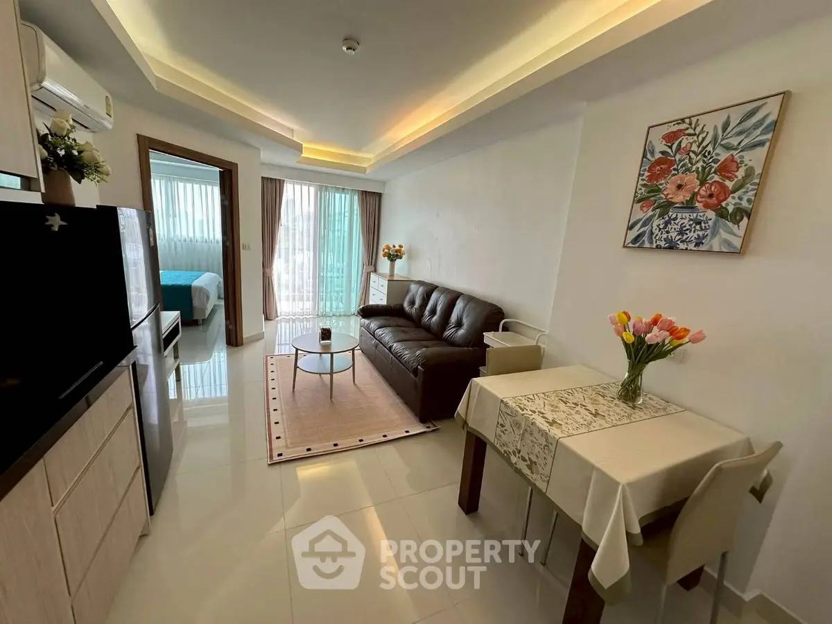 Modern living room with elegant decor and open layout in a stylish apartment.