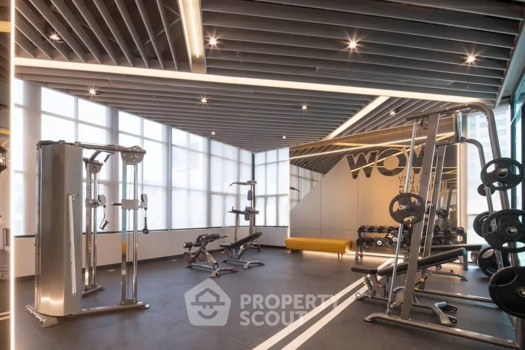 Modern gym with state-of-the-art equipment and stylish design, perfect for fitness enthusiasts.