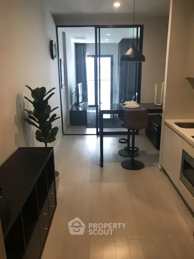 Modern living room with sleek design and stylish furniture, perfect for contemporary urban living.