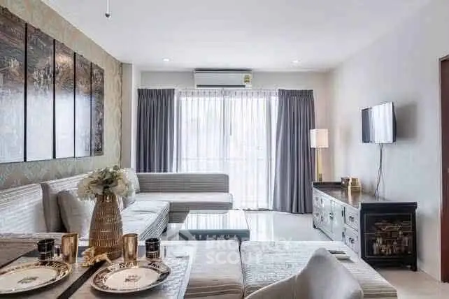 Spacious modern living room with elegant decor and ample natural light