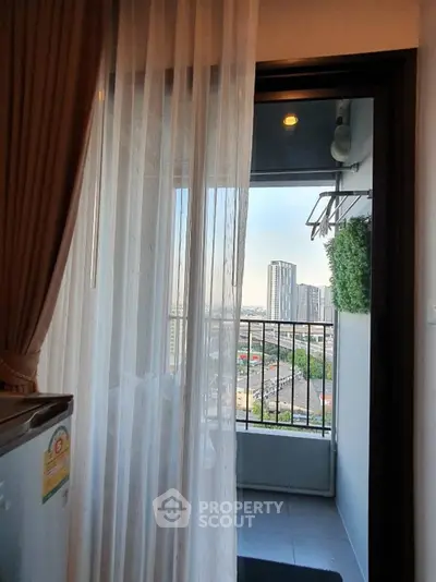 Charming balcony view with cityscape, perfect for urban living enthusiasts.