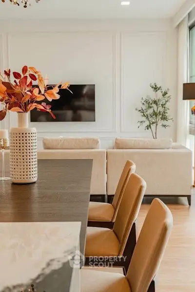 Elegant living room with modern decor and cozy seating area
