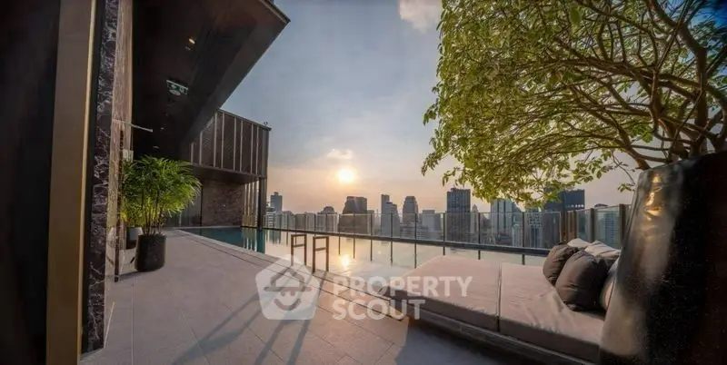 Luxurious rooftop with stunning city view and infinity pool at sunset.