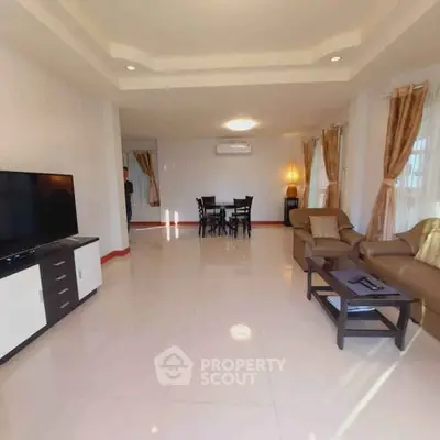 Spacious living room with modern furniture and elegant decor