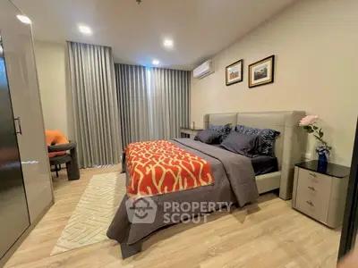Luxurious bedroom with modern decor and cozy ambiance, featuring elegant furnishings and stylish lighting.
